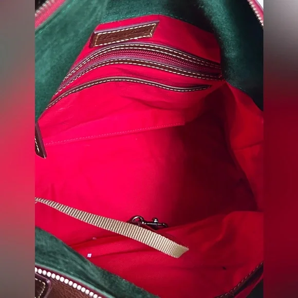 Dooney & Bourke florentina Italian Vacchetta leather handbag or crossbody